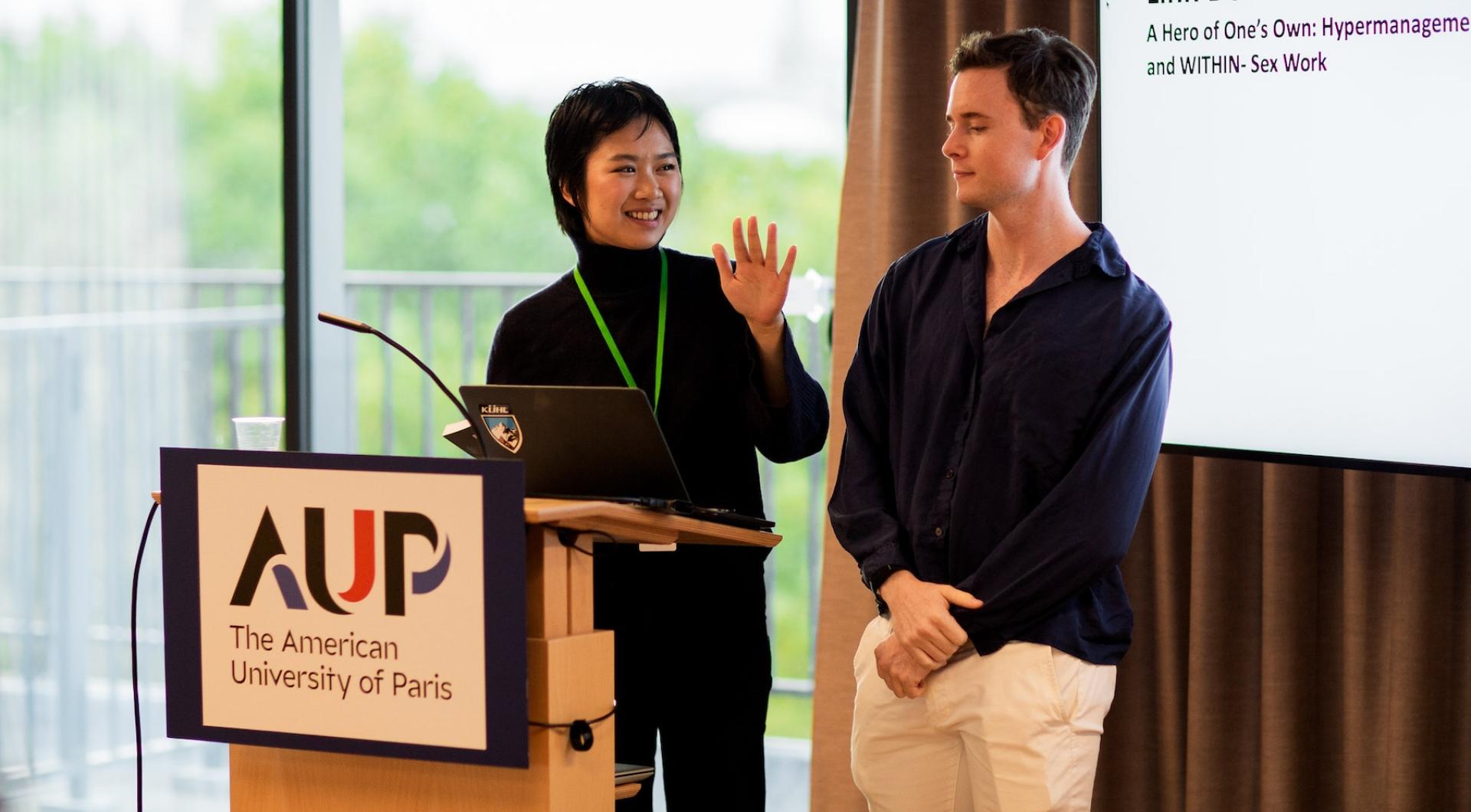 Linh Do and Adam Cohen presenting Linh Do and Adam Cohen presenting