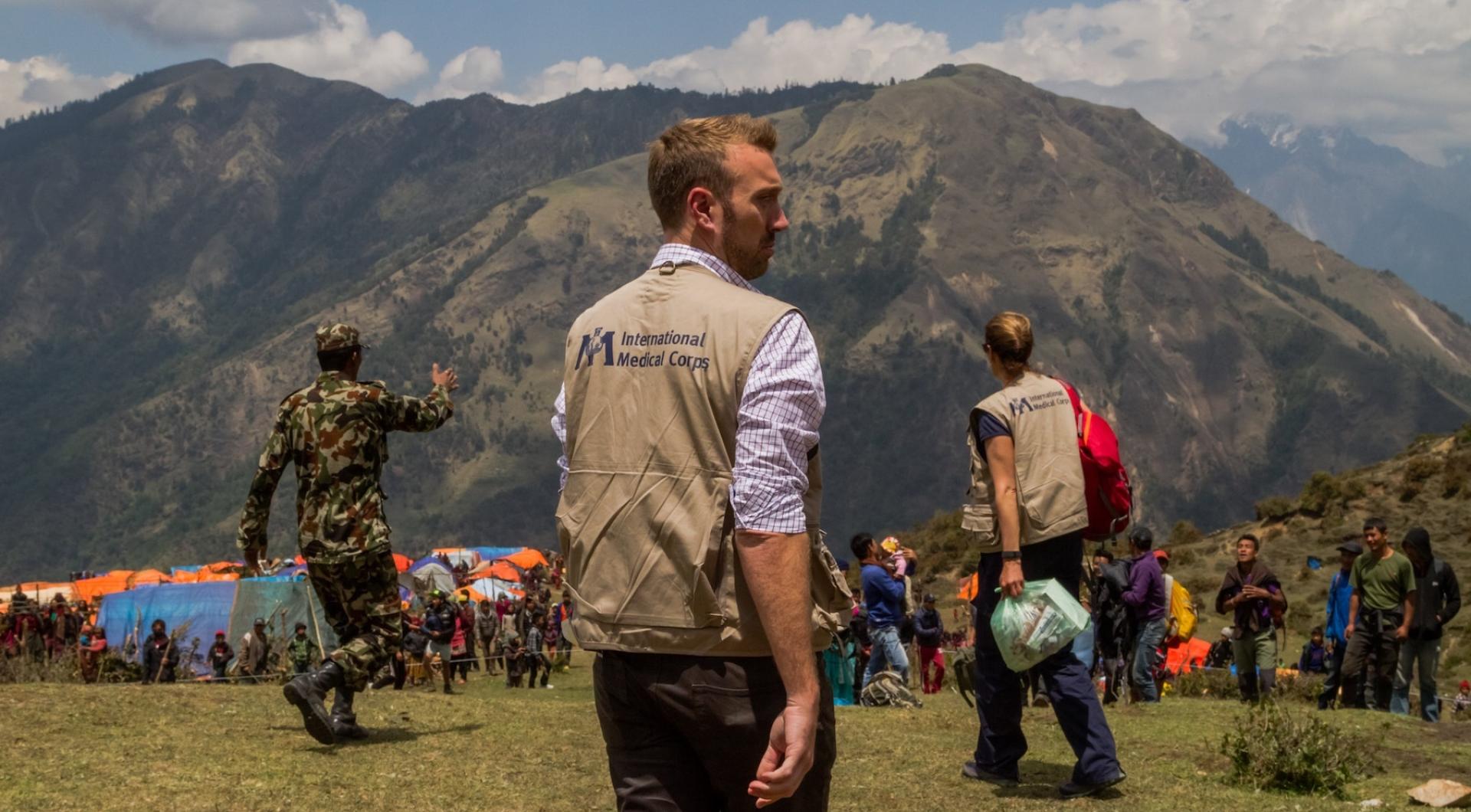 Alumnus Sean Casey on the ground after an earthquake