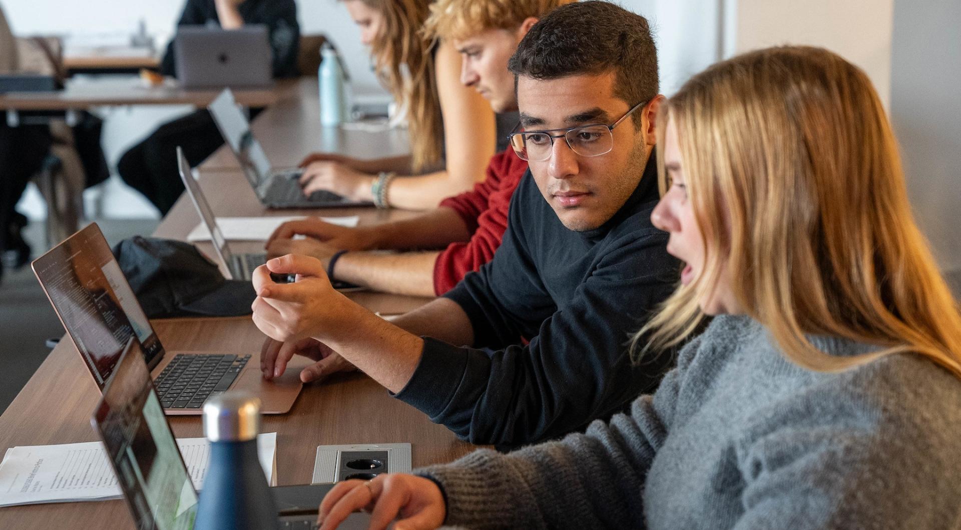 Students discuss in class